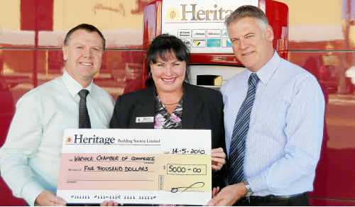 Business Excellence Awards committee chair Danny Spry, Heritage Building Society Warwick branch manager Donna Neale-Arnold and Heritage Building Society regional manager Wayne Langford cheque out one of the prizes on offer. Business Excellence Awards committee chair Danny Spry, Heritage Building Society Warwick branch manager Donna Neale-Arnold and Heritage Building Society regional manager Wayne Langford cheque out one of the prizes on offer.